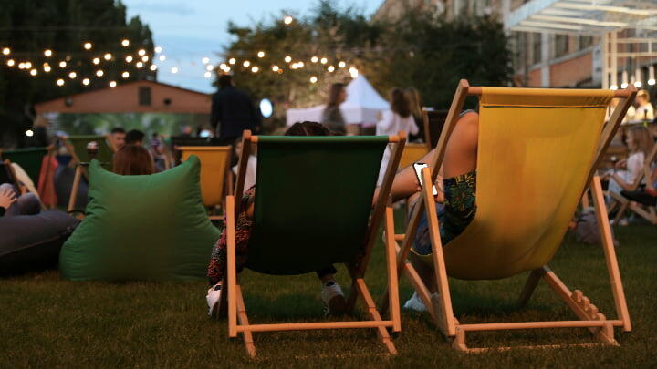Deck chairs set up at an outdoor cinema