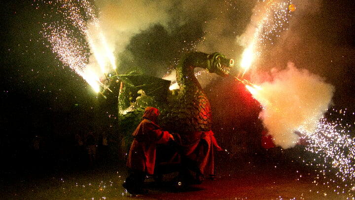 Fire devils performing at a Barcelona street festival