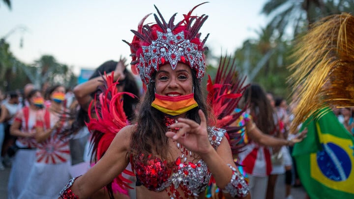 A smiling dancer at the Barcelona Pride parade