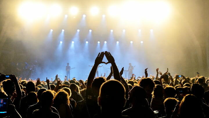 Silhouettes of a crowd at a Barcelona concert
