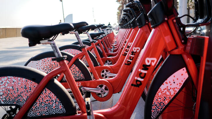 Multiple Barcelona rental bikes parked up