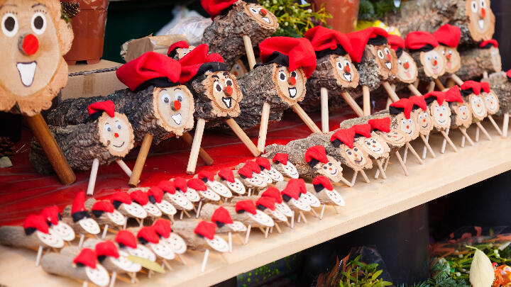 A market stall displaying various sizes of Caga Tió ornaments