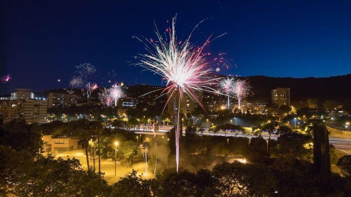 Firework explodes over the city during the Night of Fire for Sant Joan, Barcelona