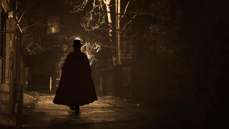 Model dressed as Jack the Ripper on a London street