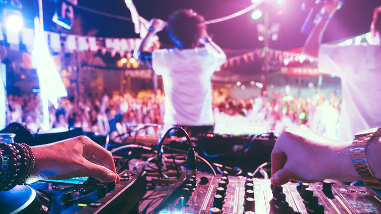 A DJ gets the crowd jumping at a London July festival